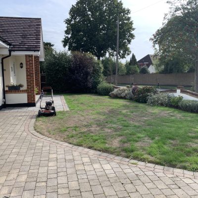 Lawn maintenance Orpington during professional grass treatment and garden care